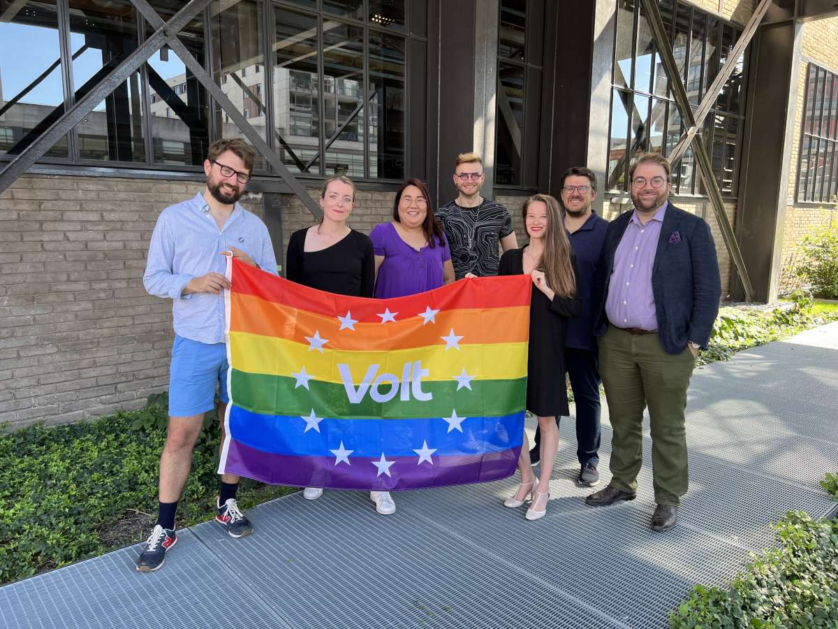 Volters holding a Volt pride flag